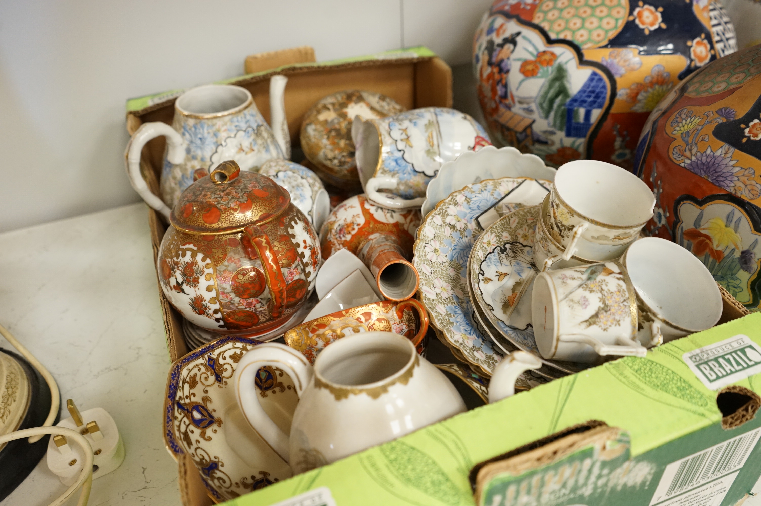 A large collection of Chinese and Japanese ceramics to include a pair of Satsuma vases, a Satsuma jar and cover and Imari wares